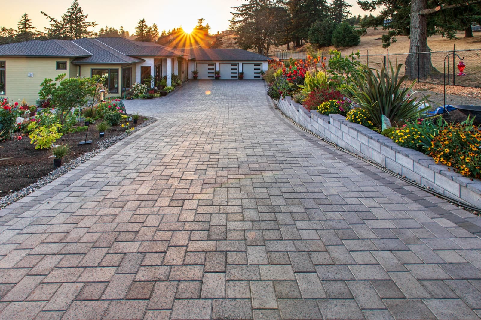 Permeable paver driveway with granite soldier-course border